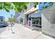 Stylish condo building entrance with large glass windows, modern signage, and convenient street access for urban living at 353 E Bonneville Ave # 313, Las Vegas, NV 89101