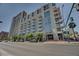 Contemporary high-rise condo building featuring balconies and expansive windows offers an upscale urban living experience at 353 E Bonneville Ave # 313, Las Vegas, NV 89101