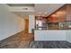 Modern kitchen features stainless steel appliances, granite countertops, and sleek wood cabinetry at 353 E Bonneville Ave # 313, Las Vegas, NV 89101