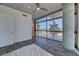 Bright main bedroom with large windows, hardwood floors and concrete pillar at 353 E Bonneville Ave # 313, Las Vegas, NV 89101