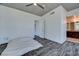 Main bedroom with an ensuite bathroom, large windows and hardwood floors at 353 E Bonneville Ave # 313, Las Vegas, NV 89101