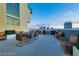 This rooftop deck features views of the city skyline, ample seating, and space for entertaining friends and Gathering at 353 E Bonneville Ave # 313, Las Vegas, NV 89101