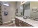 Bathroom featuring double sinks, modern fixtures, and stylish decor for a comfortable, appealing space at 365 Sapphire Rock Ave, Las Vegas, NV 89183