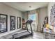 Bright exercise room with modern equipment, mirrors, and natural light for an energizing workout space at 365 Sapphire Rock Ave, Las Vegas, NV 89183