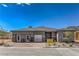 Charming single-story home with stone accents, manicured landscaping, and a 'Model Home' sign at 365 Sapphire Rock Ave, Las Vegas, NV 89183