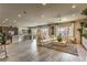 Spacious open-concept living space with modern decor, dining area, and abundant natural light at 365 Sapphire Rock Ave, Las Vegas, NV 89183