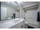 Modern bathroom with sleek fixtures, white vanity, and a framed mirror at 4083 Nook Way # A, Las Vegas, NV 89103