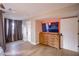 Primary bedroom boasts hardwood floors, a large dresser and updated fixtures and paint at 4083 Nook Way # A, Las Vegas, NV 89103