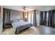 Primary bedroom with natural light, and hardwood floors at 4083 Nook Way # A, Las Vegas, NV 89103