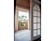 View of private patio with stylish archway from primary bedroom at 4083 Nook Way # A, Las Vegas, NV 89103