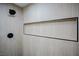 Updated shower with a black rainfall shower head, custom tile surround and built in niche at 4083 Nook Way # A, Las Vegas, NV 89103