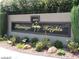 The Flamingo Heights community sign is surrounded by low maintenance landscaping in Las Vegas, Nevada at 4083 Nook Way # A, Las Vegas, NV 89103