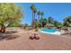 Large backyard features a picnic table and pool at 4542 Amber Canyon Ln, Las Vegas, NV 89129