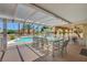 Covered patio with dining and a pool at 4542 Amber Canyon Ln, Las Vegas, NV 89129