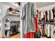 Organized walk-in closet with shelves and hanging storage at 4542 Amber Canyon Ln, Las Vegas, NV 89129