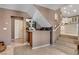 Lower level featuring a wet bar, storage, and stairs leading to upper level at 4542 Amber Canyon Ln, Las Vegas, NV 89129