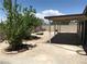 The home's covered patio sits in the gravel-covered backyard at 462 Crestway Rd, Henderson, NV 89015