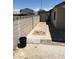 A concrete patio features red brick trim, along with a small area designated for landscaping at 462 Crestway Rd, Henderson, NV 89015