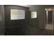Comfortable bedroom featuring plush carpet, a window, and a mirrored closet at 462 Crestway Rd, Henderson, NV 89015