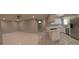 Spacious open-concept living and kitchen area with seamless flooring and updated appliances at 462 Crestway Rd, Henderson, NV 89015