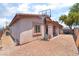 Backyard with a basketball hoop and rock landscaping at 4656 E Desert Inn Rd, Las Vegas, NV 89121