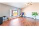 Bright bedroom with a large window and hardwood floors at 4656 E Desert Inn Rd, Las Vegas, NV 89121