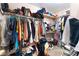 Walk-in closet with ample storage space for clothes and accessories at 4656 E Desert Inn Rd, Las Vegas, NV 89121