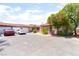 Charming single-story home featuring a spacious driveway and desert landscaping at 4656 E Desert Inn Rd, Las Vegas, NV 89121