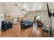 Open living room with vaulted ceilings and an open view to the kitchen at 4656 E Desert Inn Rd, Las Vegas, NV 89121