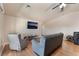 Bright living room with modern furnishings and easy access to other rooms at 4656 E Desert Inn Rd, Las Vegas, NV 89121