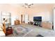 Large main bedroom features carpet floors, ceiling fans, and attached bath at 4656 E Desert Inn Rd, Las Vegas, NV 89121