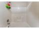 Clean white shower and tub combination with tiled walls in well maintained bathroom at 4656 E Desert Inn Rd, Las Vegas, NV 89121