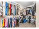 Large walk-in closet with rods and shelves for optimized storage at 4656 E Desert Inn Rd, Las Vegas, NV 89121