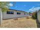 Expansive backyard with perimeter fencing and desert-friendly landscaping, offering privacy at 4807 Sacks Dr, Las Vegas, NV 89122