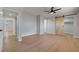 Spacious bedroom featuring light wood floors, and a barn door to the closet at 4807 Sacks Dr, Las Vegas, NV 89122