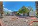 Drought tolerant landscaped front yard featuring brick trim and a gated entrance providing privacy to this charming single story home at 4807 Sacks Dr, Las Vegas, NV 89122