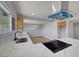 Bright kitchen featuring marble countertops, a black faucet, and modern appliances at 4807 Sacks Dr, Las Vegas, NV 89122