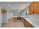 Modern kitchen featuring stainless steel appliances and light wood cabinetry at 4807 Sacks Dr, Las Vegas, NV 89122
