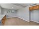 Bright area with light wood floors and a cabinet mounted at ceiling height at 4807 Sacks Dr, Las Vegas, NV 89122