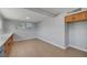 Bright area with light wood floors and a cabinet mounted at ceiling height at 4807 Sacks Dr, Las Vegas, NV 89122