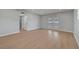 Bright living room features sleek wood floors, recessed lighting, and double glass doors at 4807 Sacks Dr, Las Vegas, NV 89122