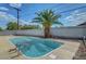 A backyard pool with clear blue water and easy access ladders at 4807 Sacks Dr, Las Vegas, NV 89122