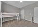Bedroom with neutral walls, carpet, and a bunk bed frame at 4833 Royal Magnolia St, North Las Vegas, NV 89031