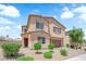 Inviting two-story residence with a well-kept yard and an attached two-car garage at 4833 Royal Magnolia St, North Las Vegas, NV 89031