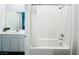 Bright bathroom with a shower-tub combo and modern fixtures at 49 Charlotte Ridge Pl, Henderson, NV 89011