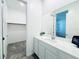 Bright bathroom with double sinks and closet at 49 Charlotte Ridge Pl, Henderson, NV 89011