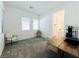 Bright bedroom with neutral walls, carpet, and views of a bathroom at 49 Charlotte Ridge Pl, Henderson, NV 89011