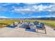 Enjoy outdoor gatherings by the fire pit with seating and scenic views for relaxing community moments at 49 Charlotte Ridge Pl, Henderson, NV 89011