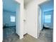Hallway with built-in cabinetry leads to bedrooms and offers storage at 49 Charlotte Ridge Pl, Henderson, NV 89011