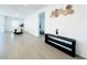 Open concept living area with dining area with modern decor and neutral tones at 49 Charlotte Ridge Pl, Henderson, NV 89011